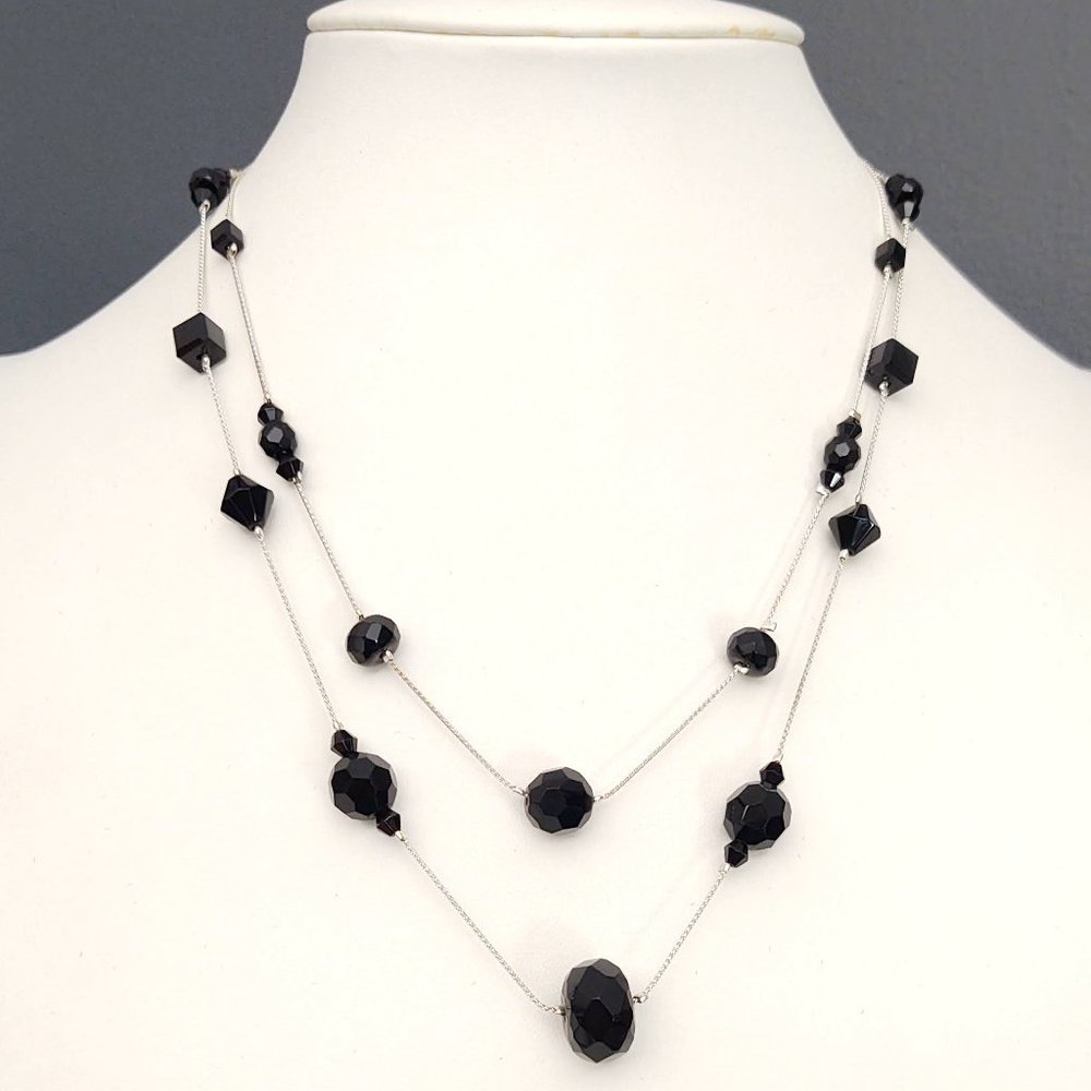 Double strand black beaded necklace on silver chains